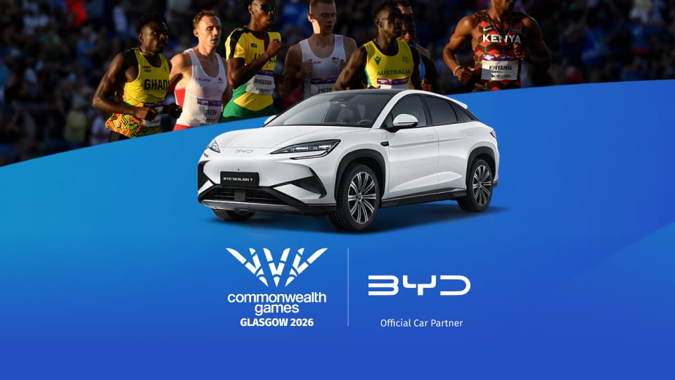 BYD Sealion 7 against a blue background runners behind.
