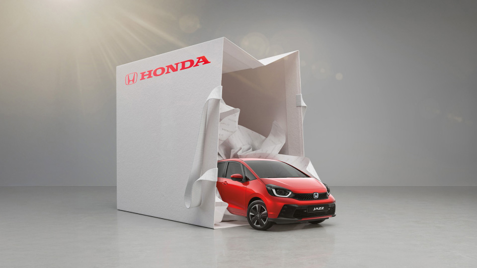 Honda Jazz driving out of a shopping bag